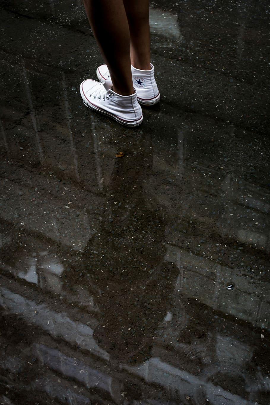 woman wearing pair of white Converse sneakers, woman standing on shallow water HD wallpaper