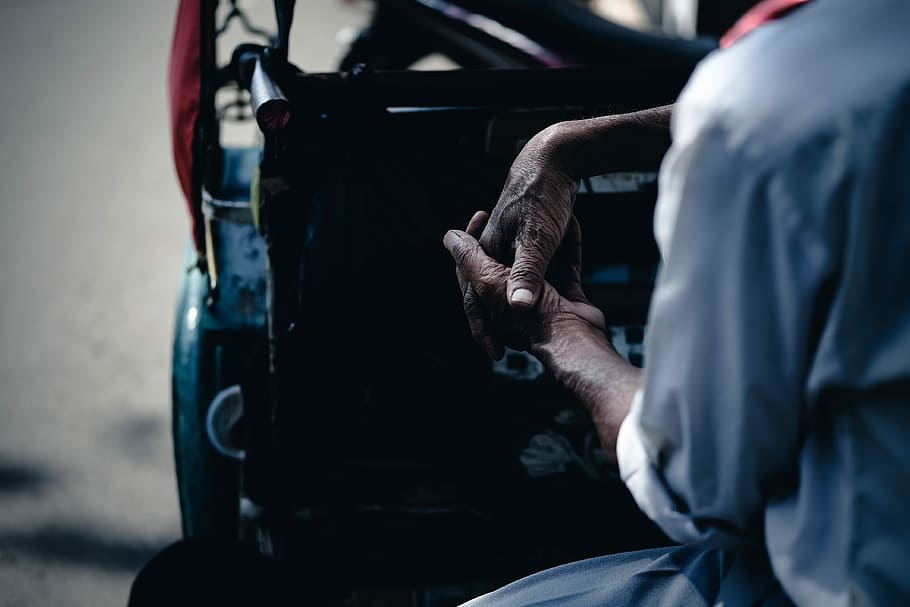 man sitting in auto rickshaw, untitled, hand, wrinkle, person