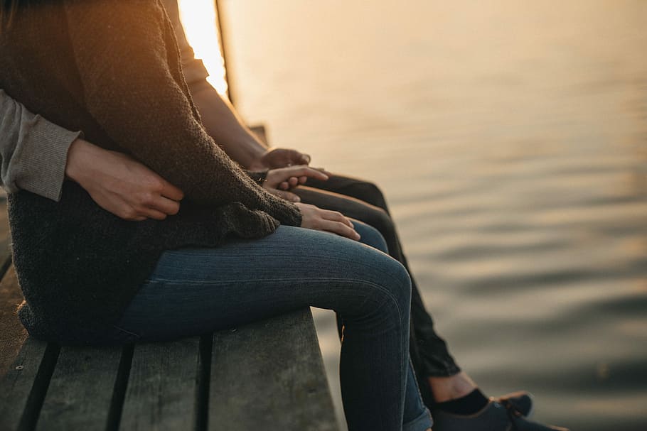 man and woman sitting on dock, couple sitting on wooden dock HD wallpaper