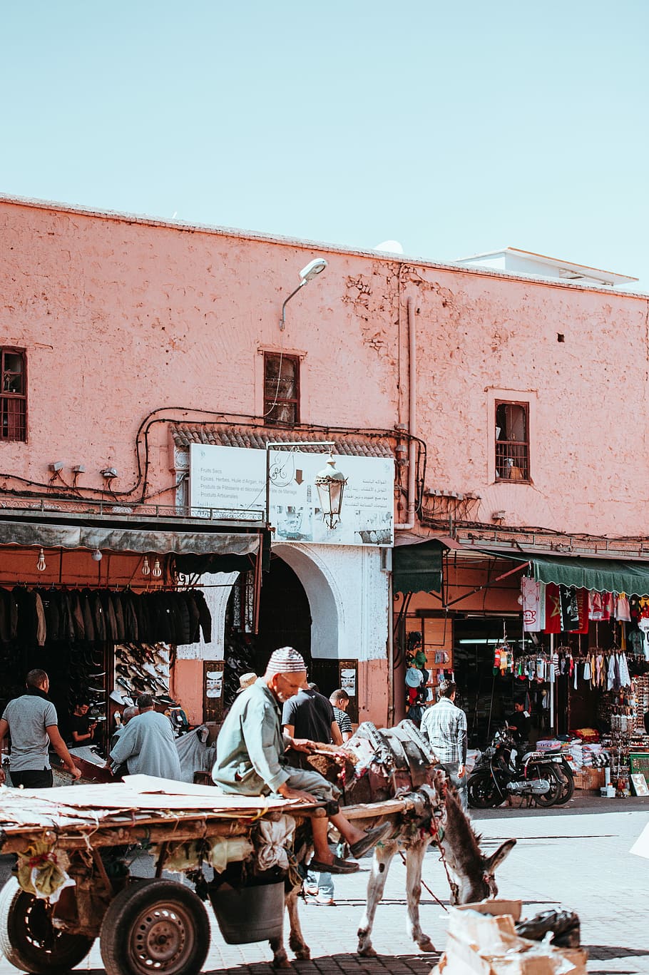 Marrakesh, man riding a carriage, city, urban, building, old