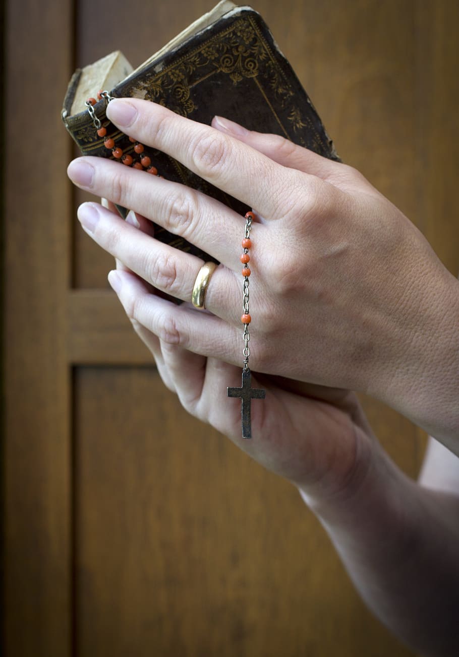 person holding bible and rosary, faith, breviary, religion, christian
