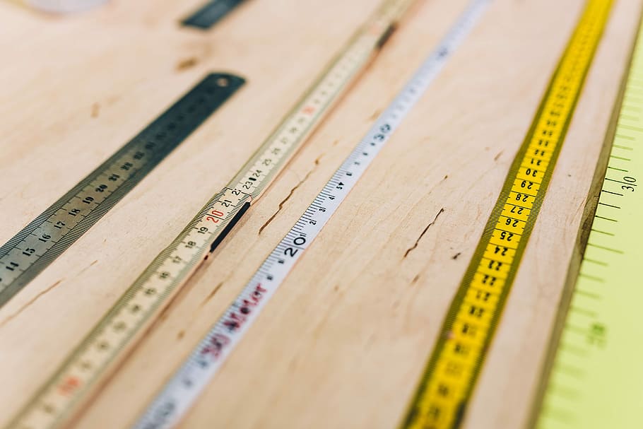 Close-ups of rulers on a wooden table, closeup, measure, tool