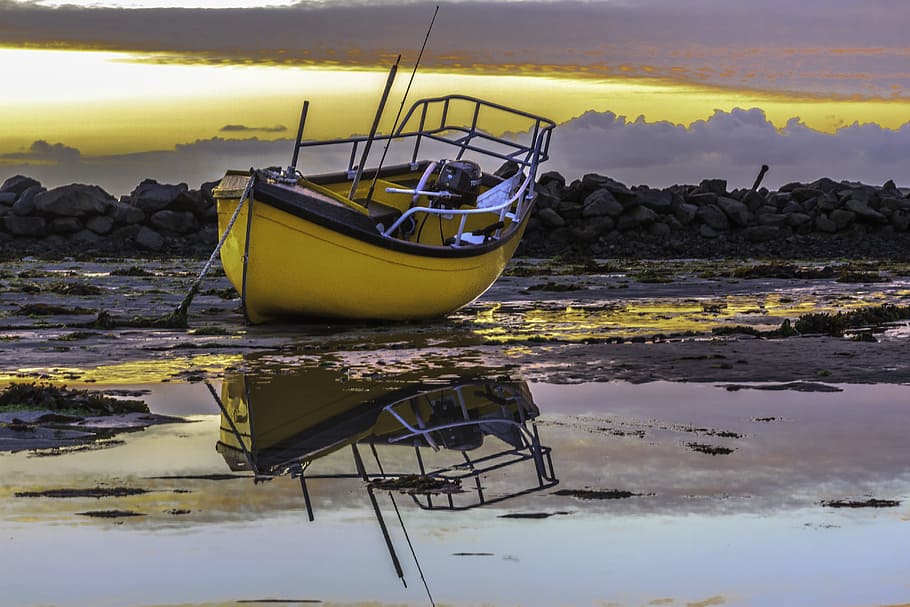photo of yellow and black outboard motorboat on body of water HD wallpaper