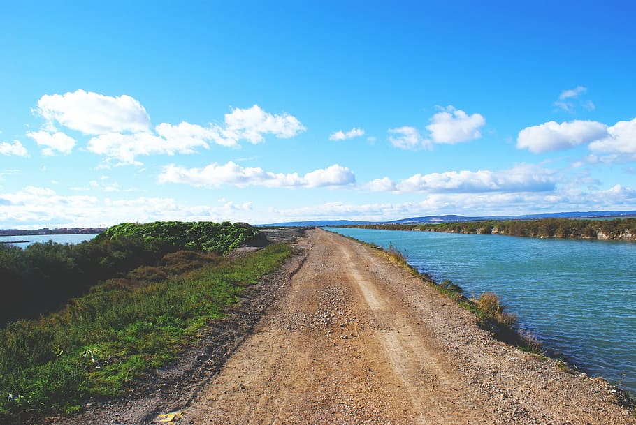 road near body of water, dirt, mud, path, trail, river, blue HD wallpaper