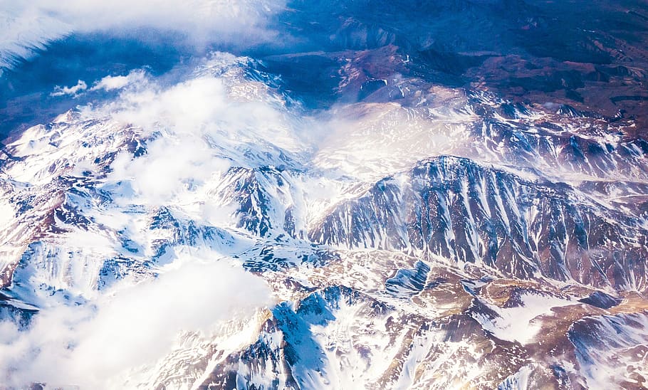 aerial photo of snow covered mountains, body of water, mountain ridge HD wallpaper