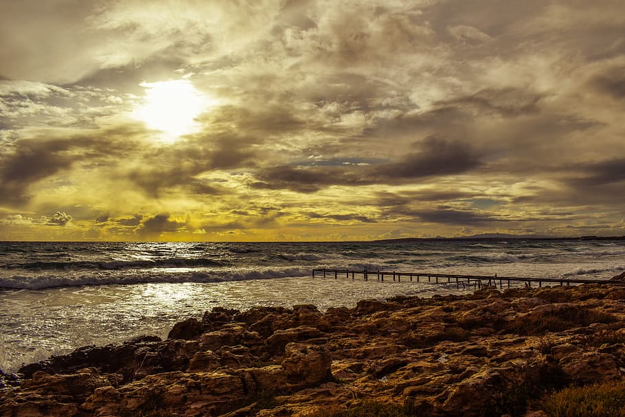 gray dock near rocky seashore during golden hour, sunset, sky HD wallpaper