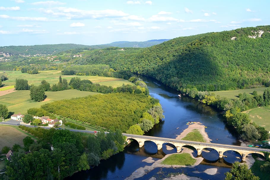 aerial photo of bridge and water at daytime, river, island, dordogne