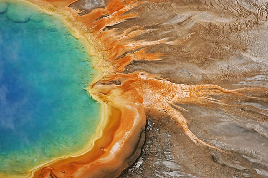 aerial photography of mountain near body of water, grand prismatic spring