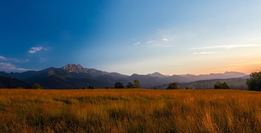 landscape, sky, clouds, sunset, dusk, meadow, field, farm, mountains HD wallpaper
