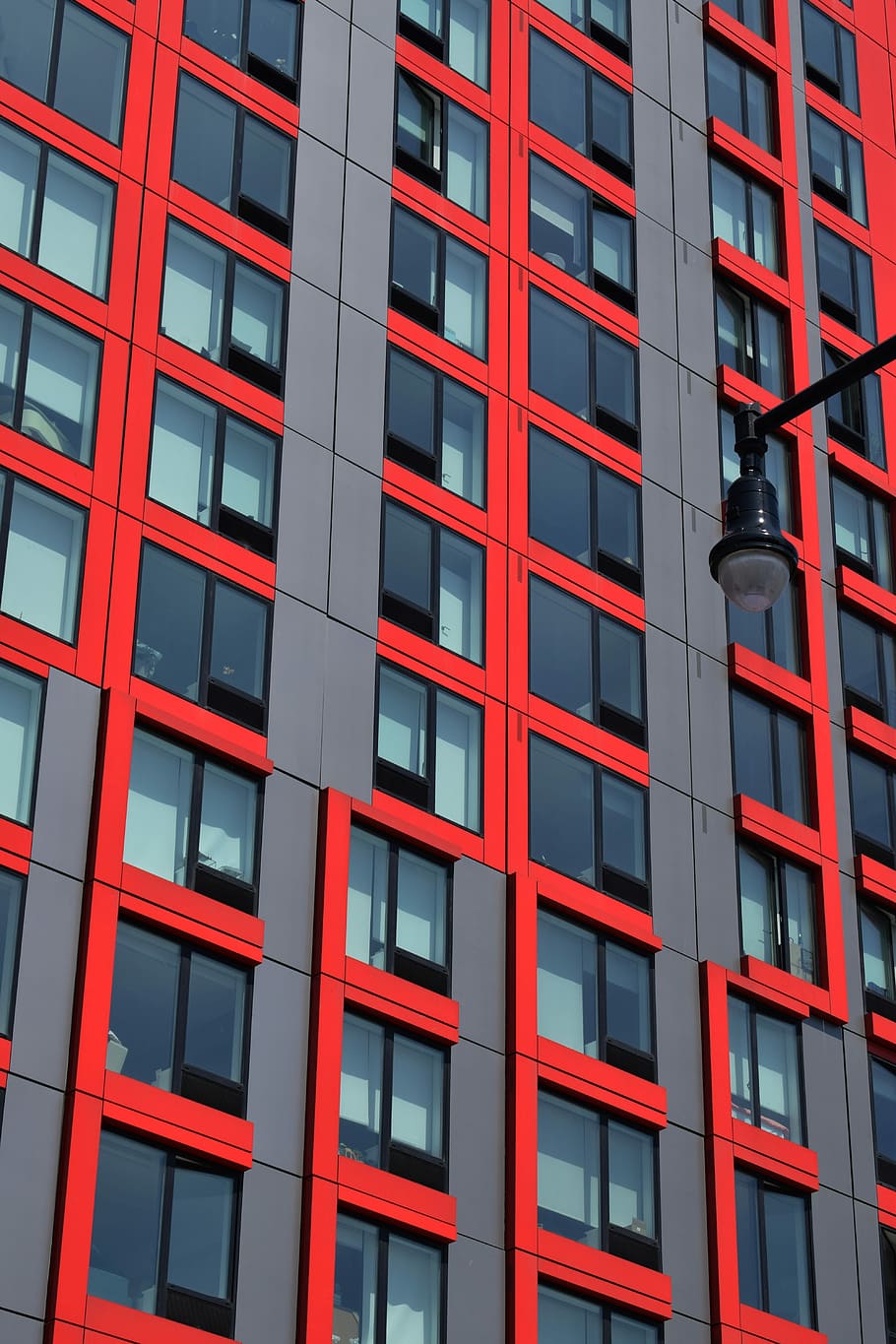 closeup photo of tall building with glass window at daytime, red and gray high rise building HD wallpaper