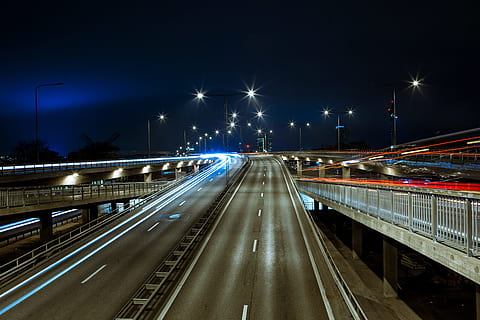 time lapsed photography of concrete curved road, time lapse photo of cars creating light streaks HD wallpaper