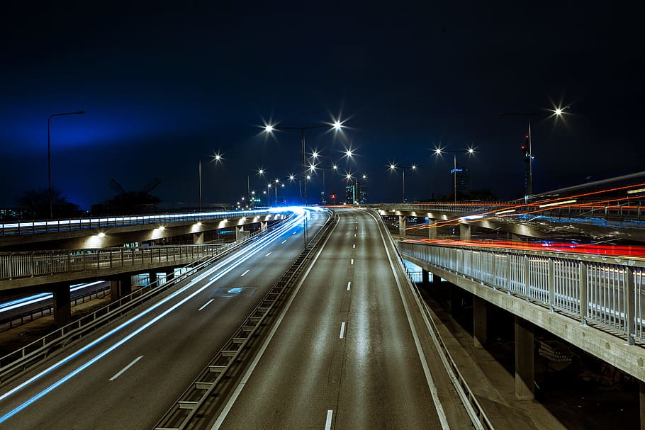 time lapsed photography of concrete curved road, time lapse photo of cars creating light streaks HD wallpaper