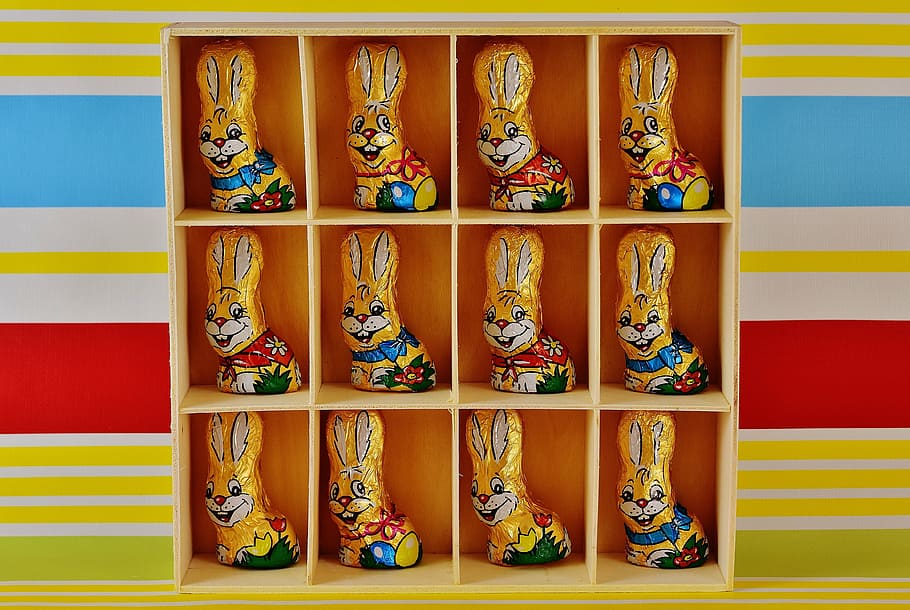 rabbit figurine lot in cubby shevles, chocolate bunnies, easter HD wallpaper