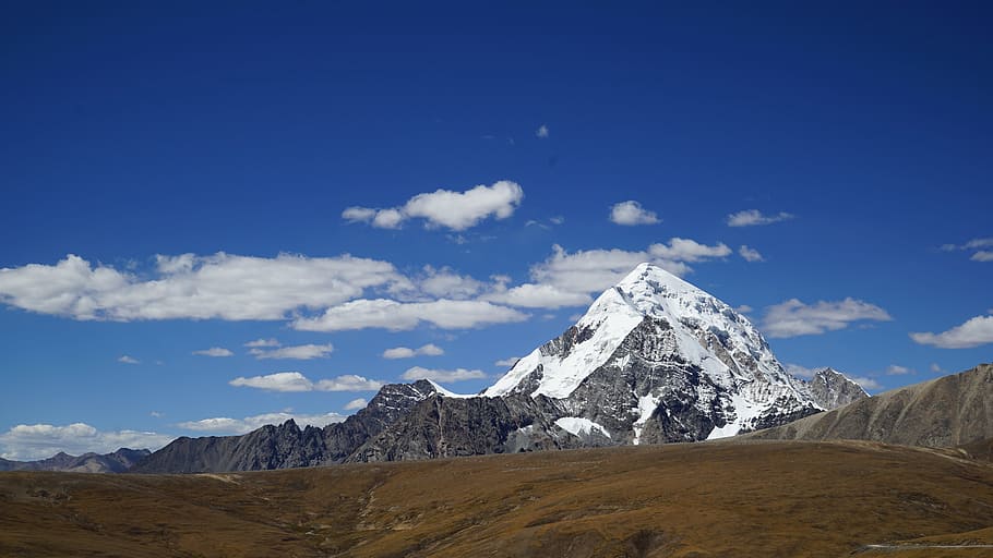 snow covered mountain under clear blue sky, snow-covered mountain under cloudy skyt HD wallpaper