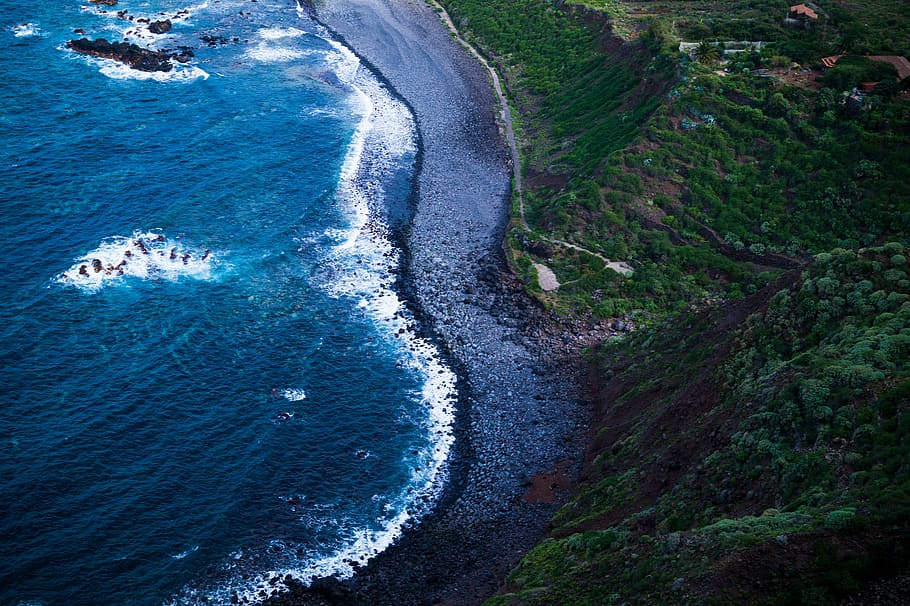 bird's-eye view photography of body of water near mountain HD wallpaper