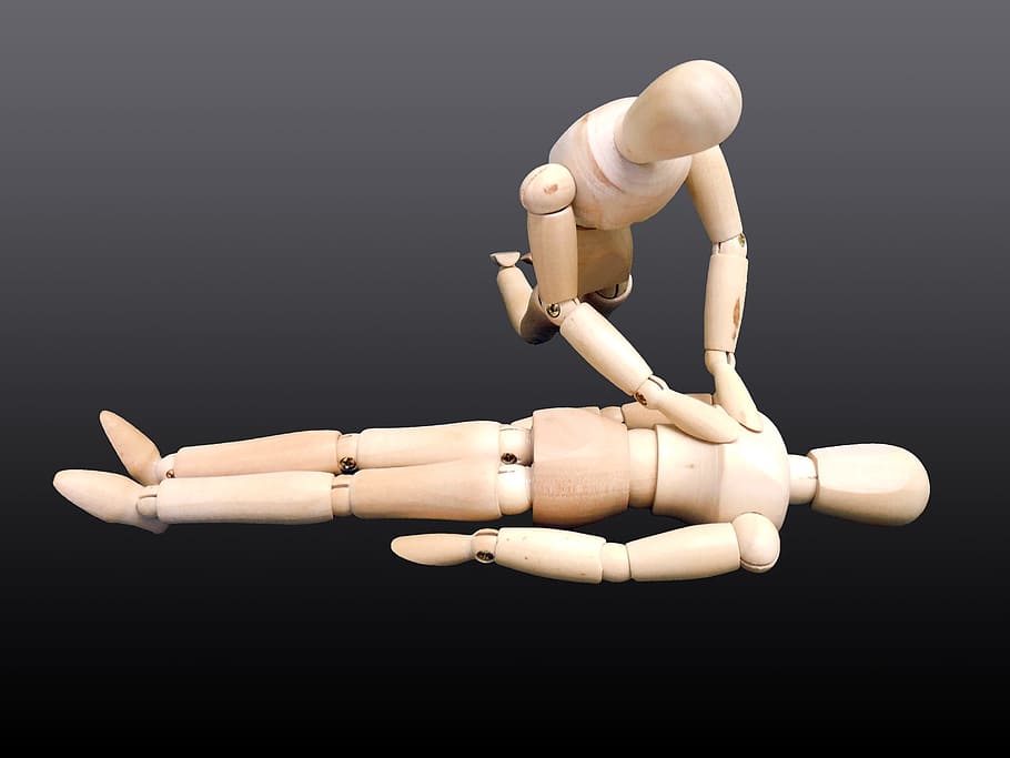 two brown wooden puppets, first aid, rescue, victims, savior HD wallpaper