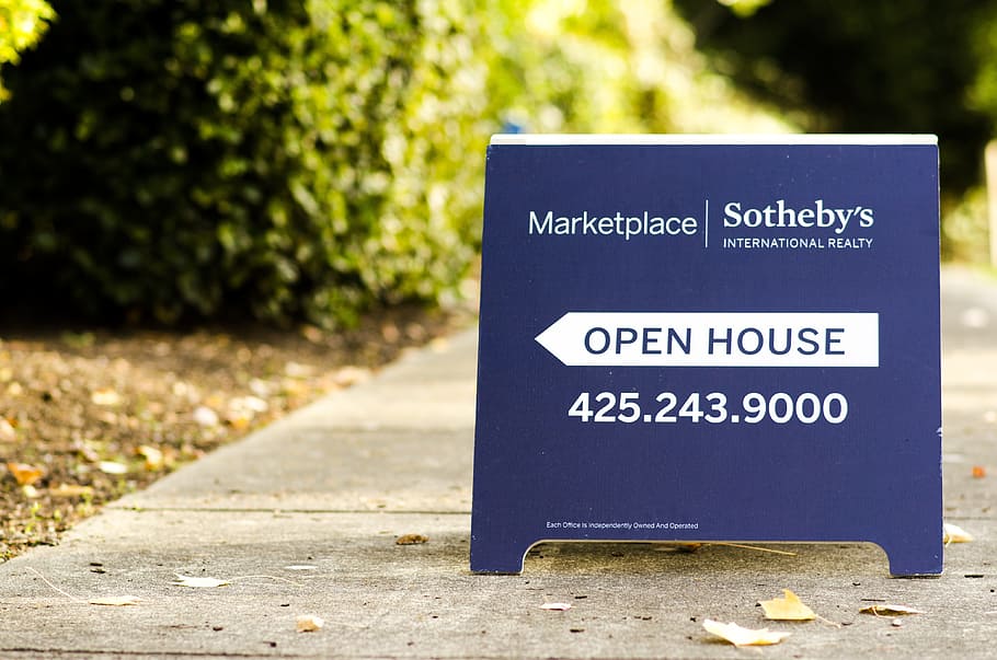 shallow focus of Market Place direction, open house, sign, aboard