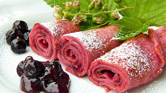 selective focus photo of swiss roll top with powered sugar and black berries HD wallpaper