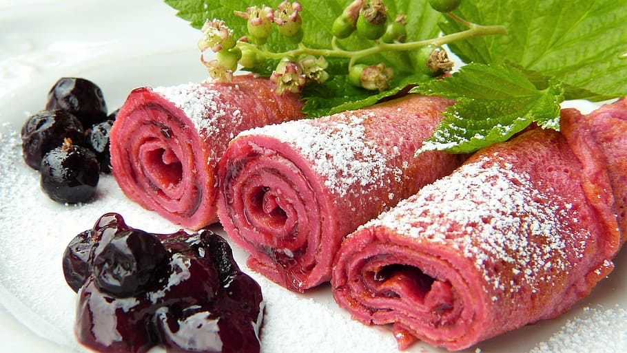 selective focus photo of swiss roll top with powered sugar and black berries HD wallpaper