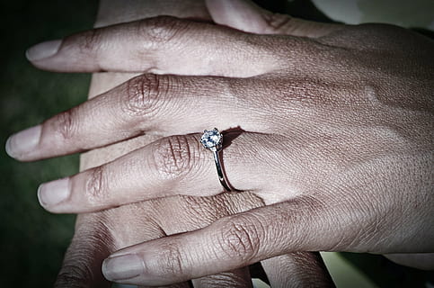 person wearing clear jeweled silver-colored ring, hands, gritty HD wallpaper