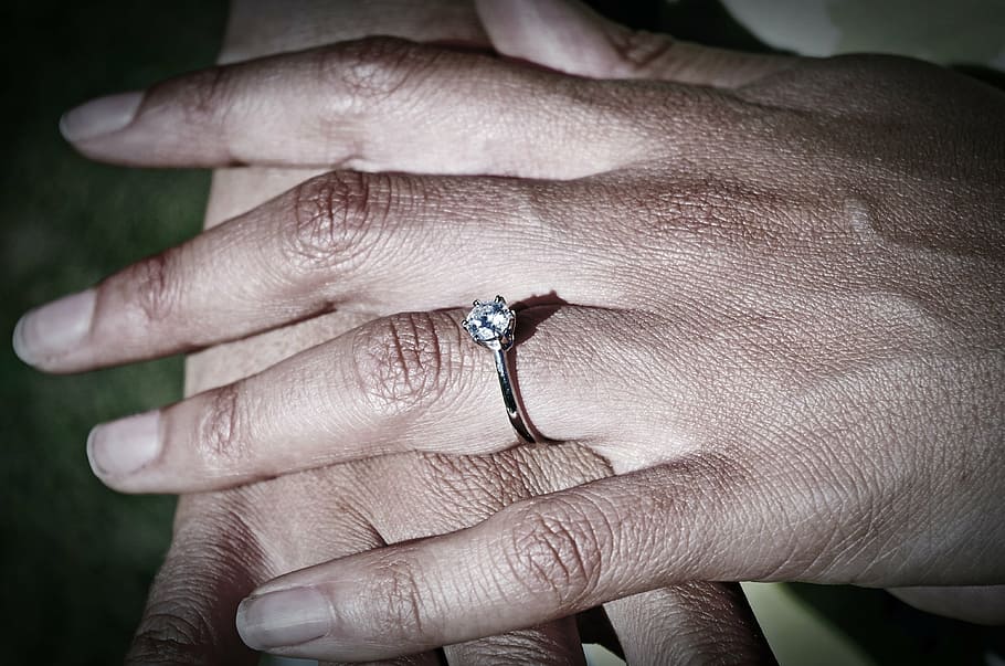 person wearing clear jeweled silver-colored ring, hands, gritty HD wallpaper