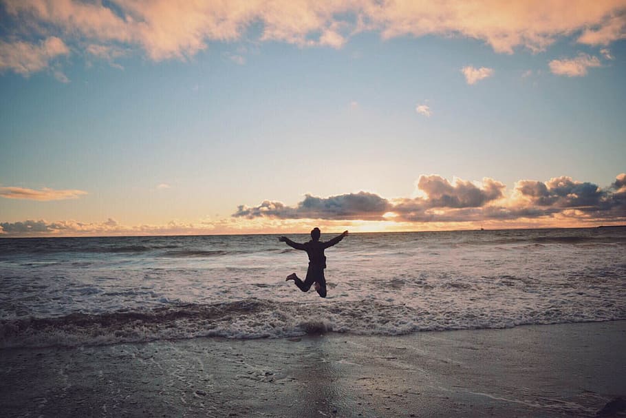 Person Taking Picture in Seashore during Sunset, beach, jumping HD wallpaper