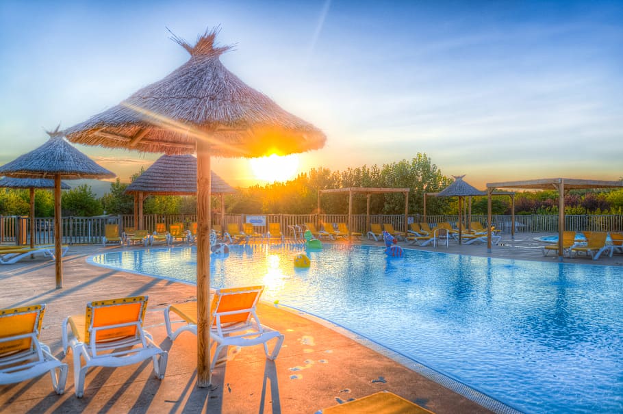 Brown and Blue Resort Surface during Daynight, chairs, clouds HD wallpaper