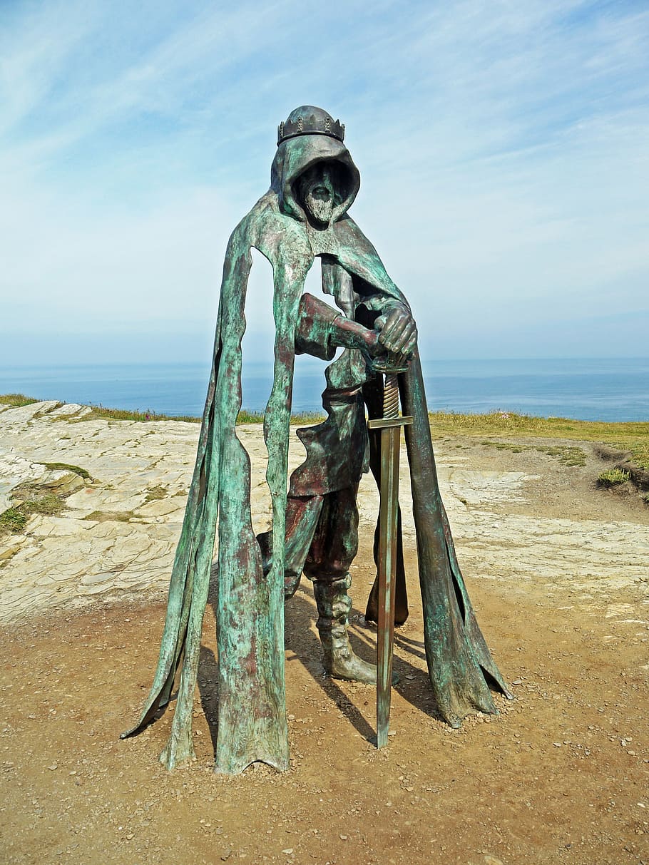 man holding sword statue during daytime, king, artus, metal, sculpture