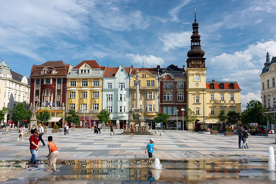 Masaryk Square buildings in Ostrava, Czech Republic, clouds, people