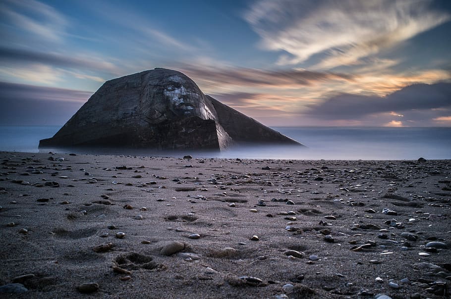 low angle photo of Edited photo of Bob Marley at daytime, gray rock formation HD wallpaper