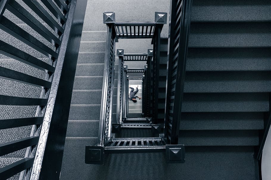 man lying on the floor near stairways, staircase, body, corpse HD wallpaper