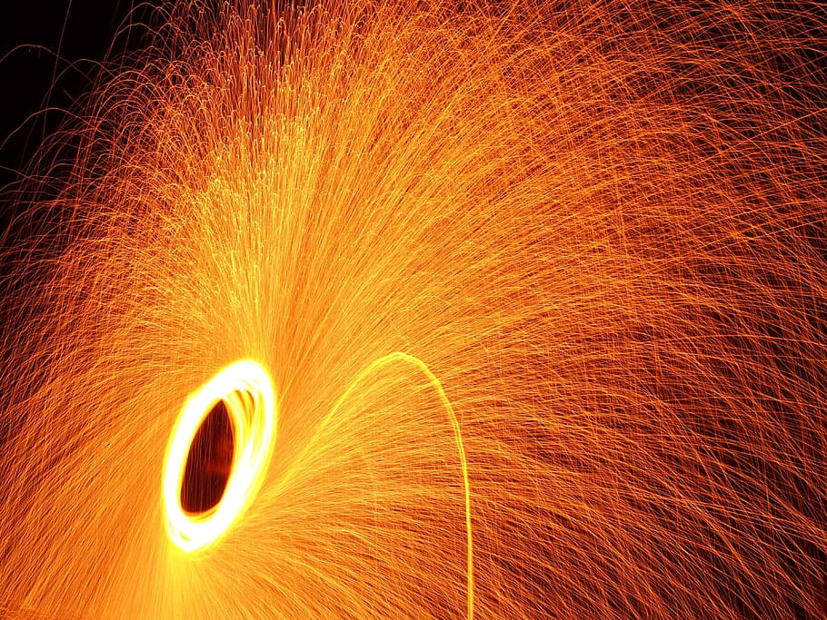 fire, sparks, night, motion, orange color, blurred motion, long exposure HD wallpaper
