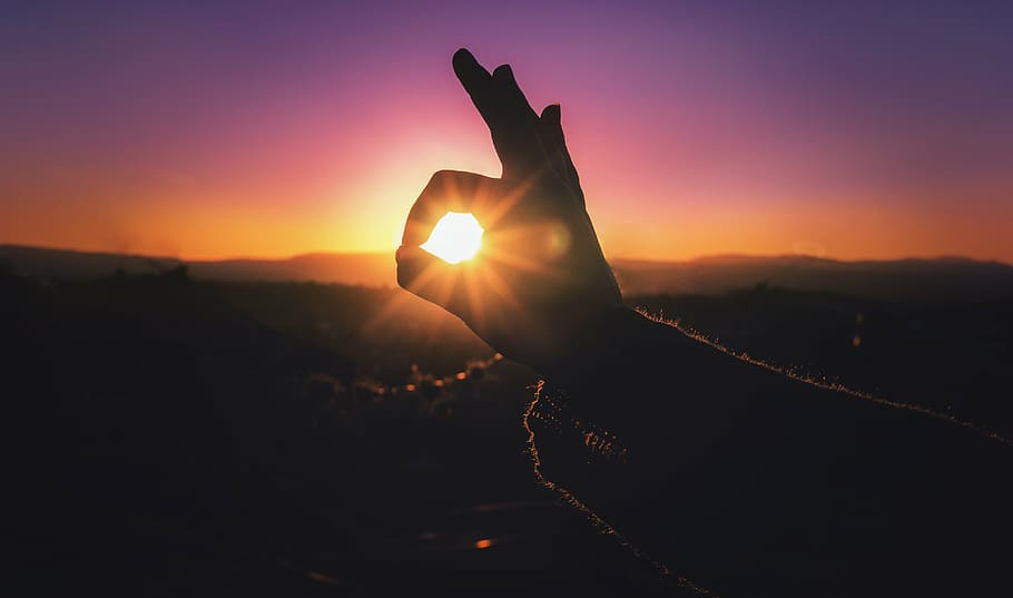 silhouette photo of okay hand sign through sunrise, sunset HD wallpaper