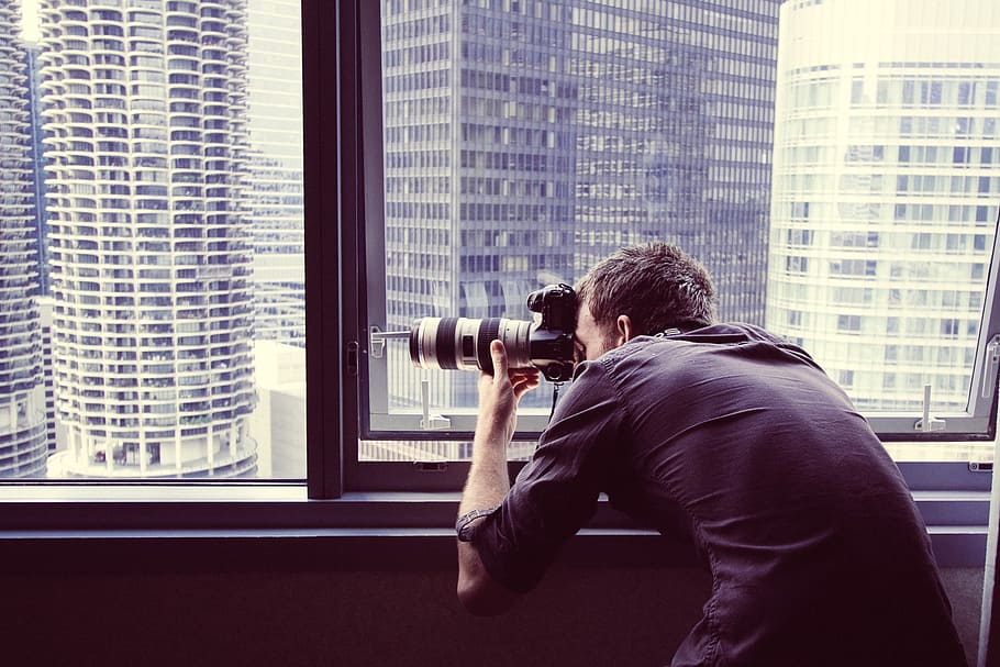 man wearing black dress shirt taking photo in building inside room, HD wallpaper