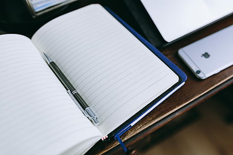 Elegant workspace with Macbook, iPhone, business cards and notebooks HD wallpaper