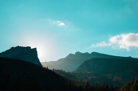 green mountains under white cloudy blue daytime sky, mountain covered with green leaf trees at day HD wallpaper