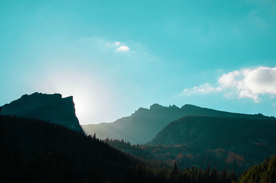 green mountains under white cloudy blue daytime sky, mountain covered with green leaf trees at day HD wallpaper