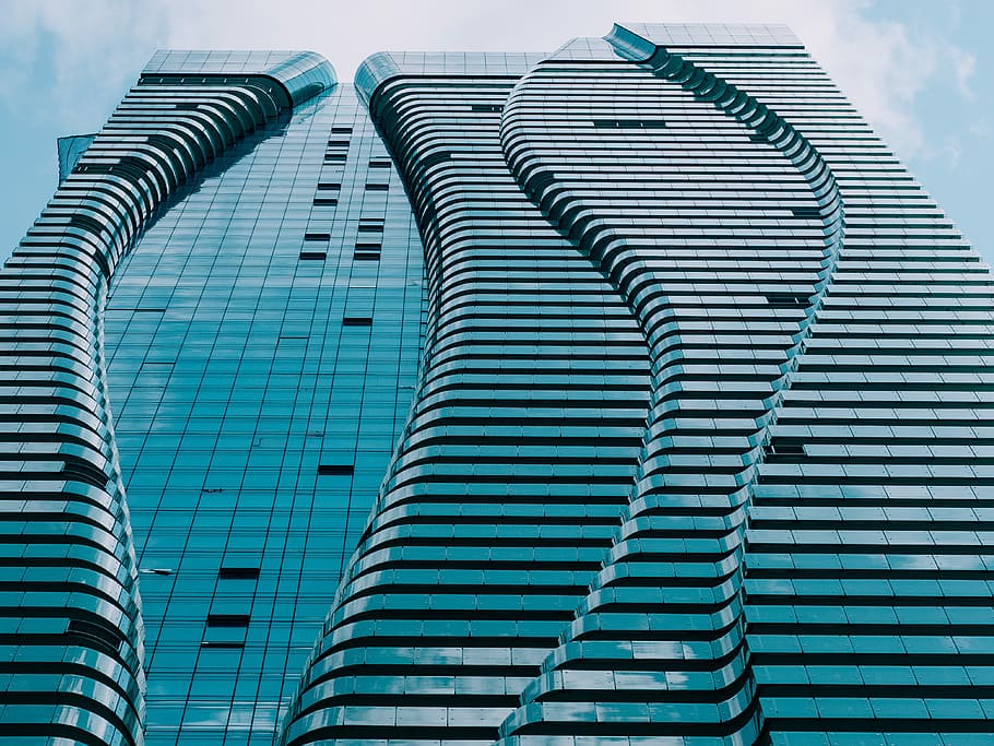 gray concrete tower building under blue and white sky, high-rise concrete building HD wallpaper