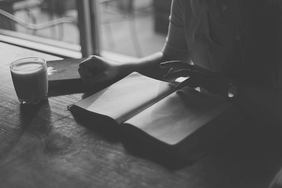 grayscale photo of person opening book, woman, elbow, sleeve HD wallpaper