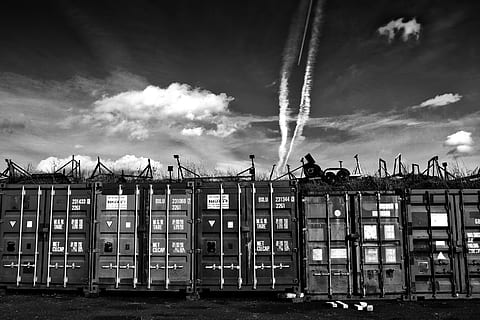 High-contrast monochrome image of some shipping containers in Faversham, Kent, England HD wallpaper