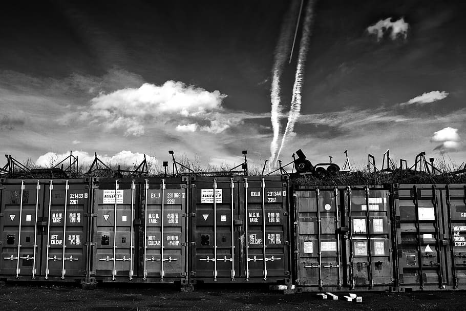 High-contrast monochrome image of some shipping containers in Faversham, Kent, England HD wallpaper