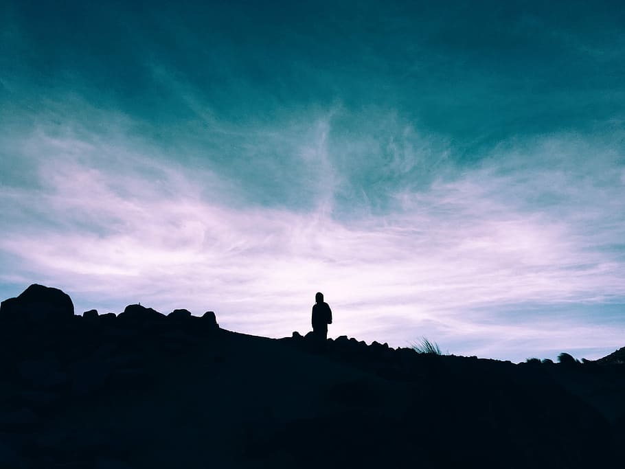 silhouette of man standing on ground under blue and white sky, silhouette of person standing on field HD wallpaper
