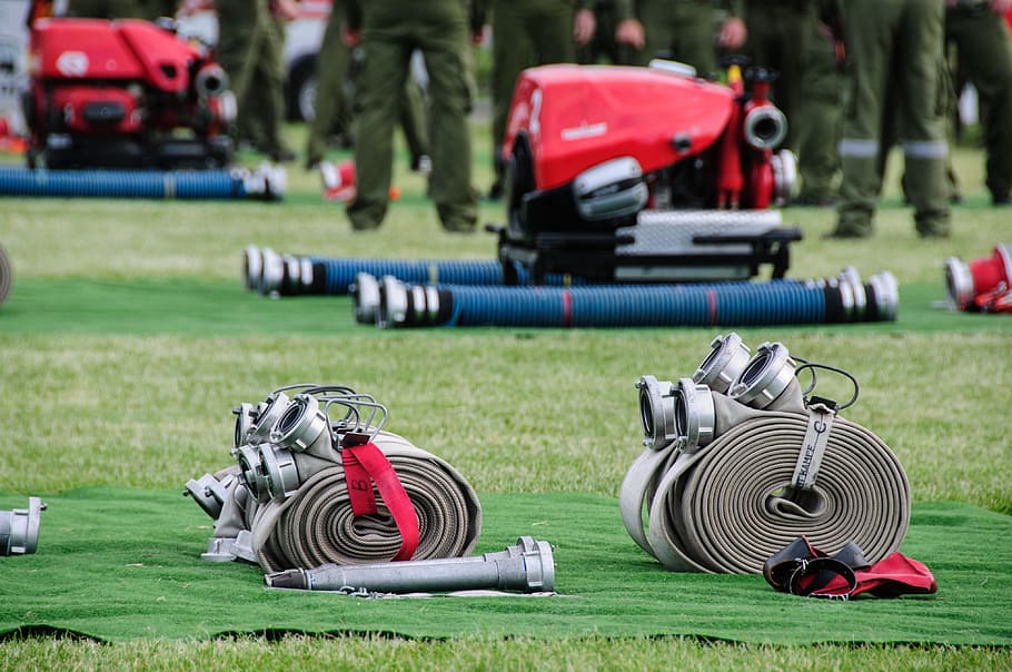 two grey fire hoses on green grass field, device, competition HD wallpaper