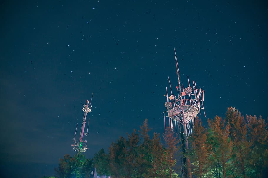 low angle photo of metal towers under night sky, star, starlight HD wallpaper