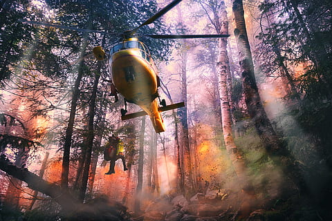 yellow helicopter dropping person at forest digital wallpaper HD wallpaper