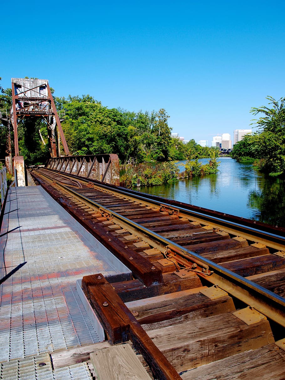 railroad tracks, perspective, train tracks, path, water, sky HD wallpaper