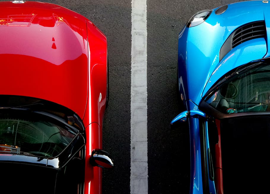 aerial photography of two red and blue cars on highway, parking, HD wallpaper