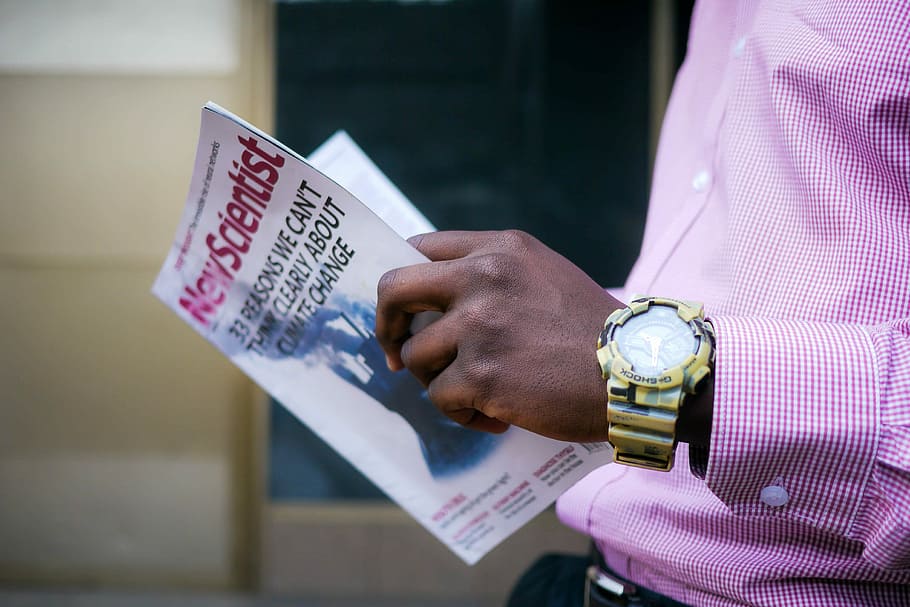 person reading New Scientist book, pink, plaid, check, watch HD wallpaper