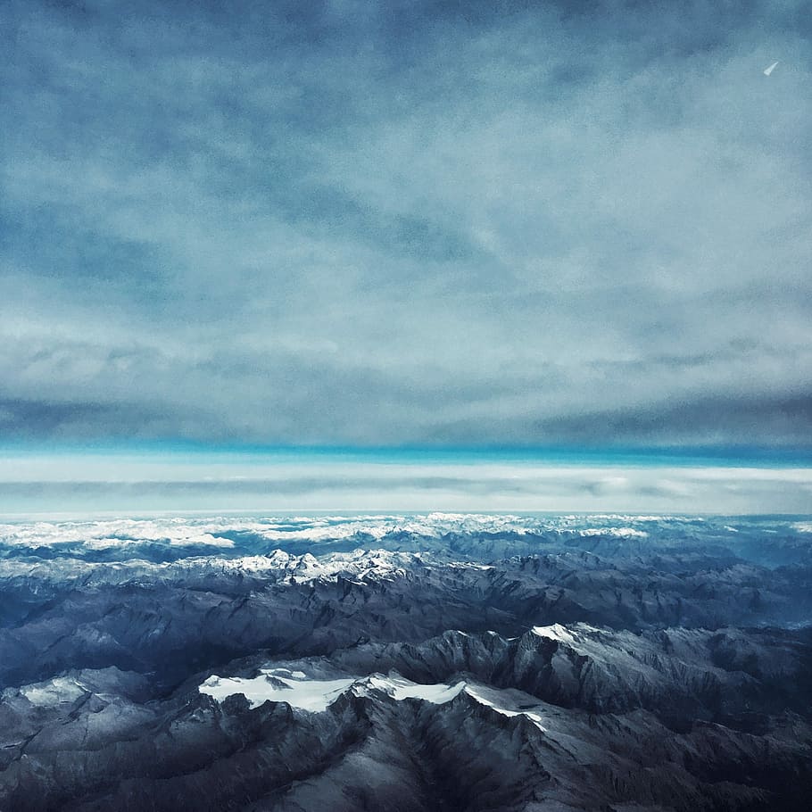 aerial photograph of a mountain, bird's-eye view of snowy mountain HD wallpaper