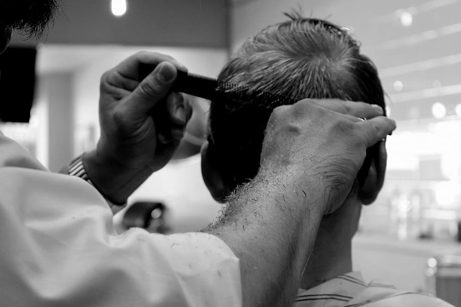 grayscale photography of barber cutting hair, haircut, salon
